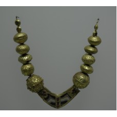 Gold necklace, sun design on the beads